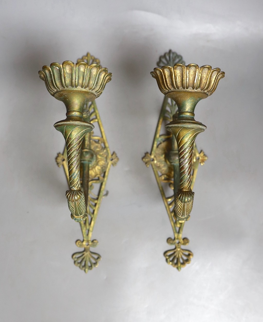 A pair of Grecian revival brass wall sconces, 30.5 cms high.